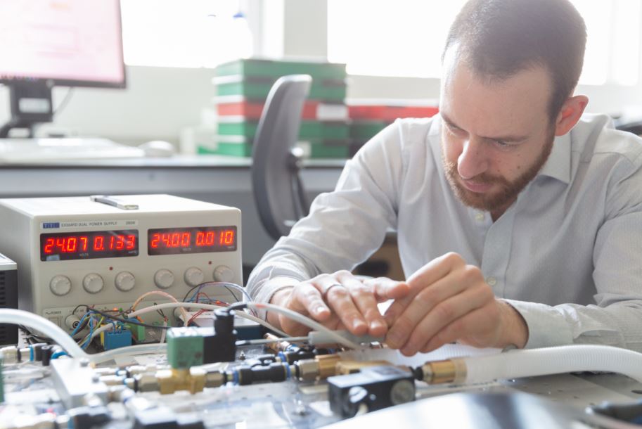 Joseph working on an early prototype of the JAMVENT ventilator